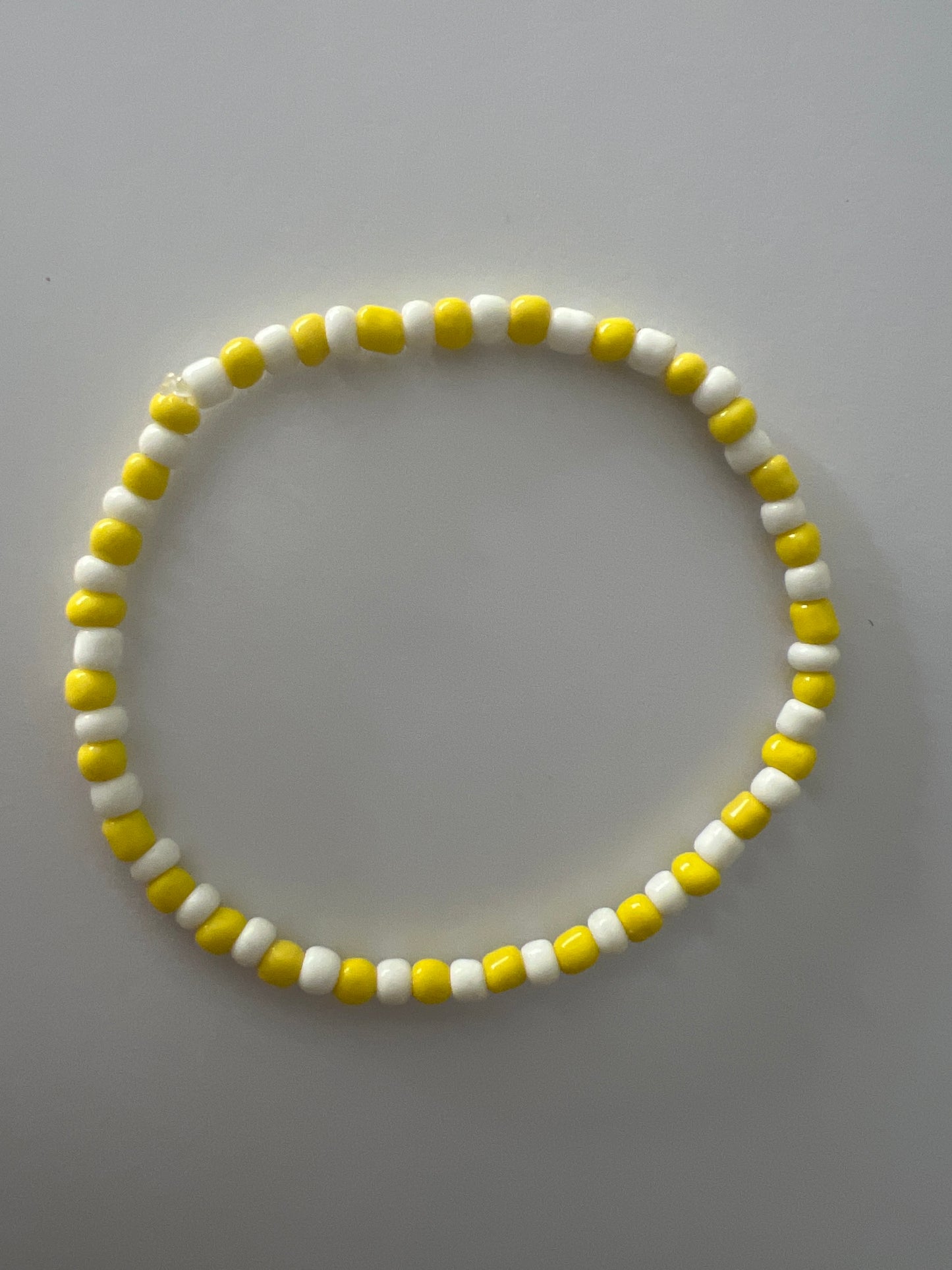 Bracelets | Ide | Stretch Orisa Beaded Bracelet – Yellow and White – 4mm | Osun Bracelet - Style 5-2